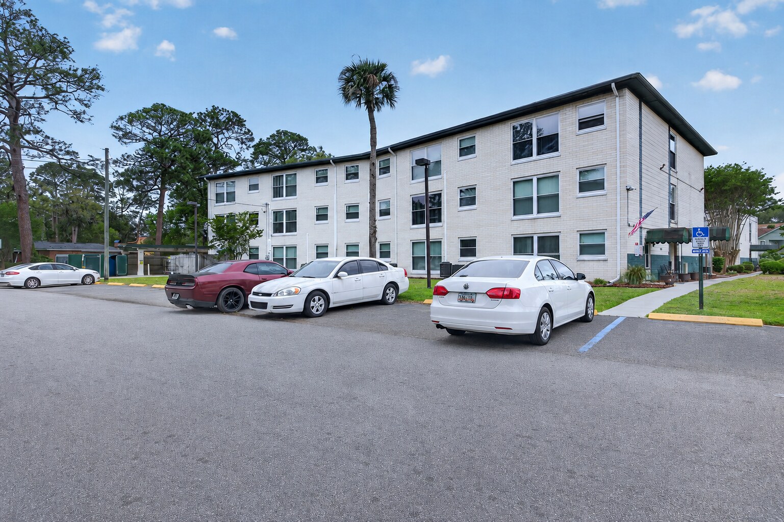Apartment building and parking area